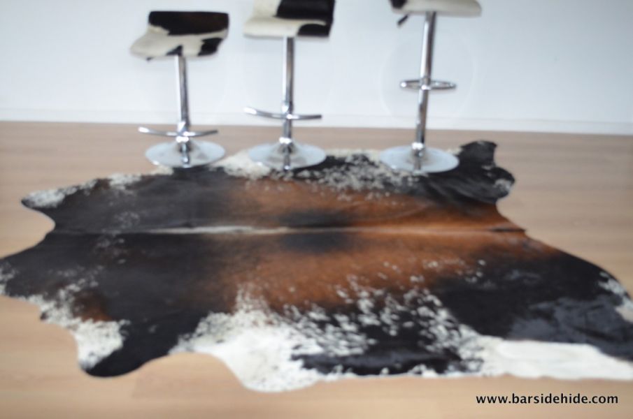 Cowhide rugs and stools